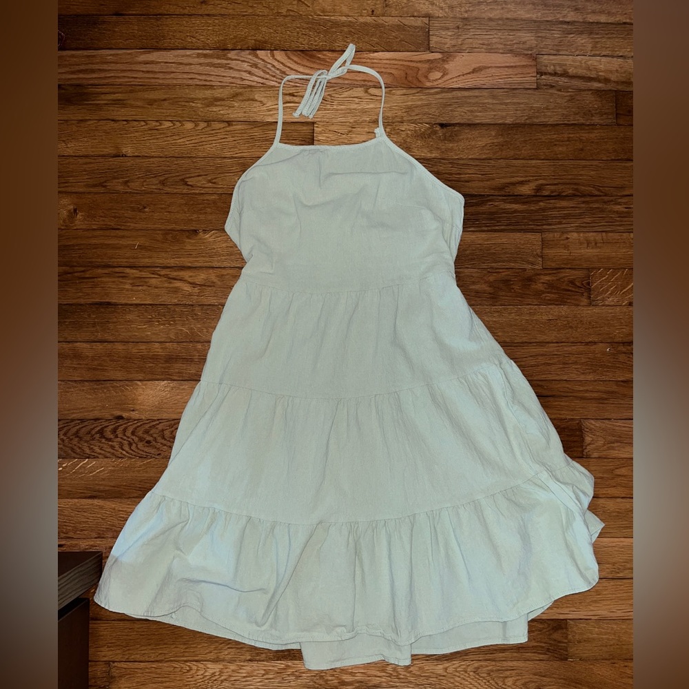 Ruffled and backless dress.